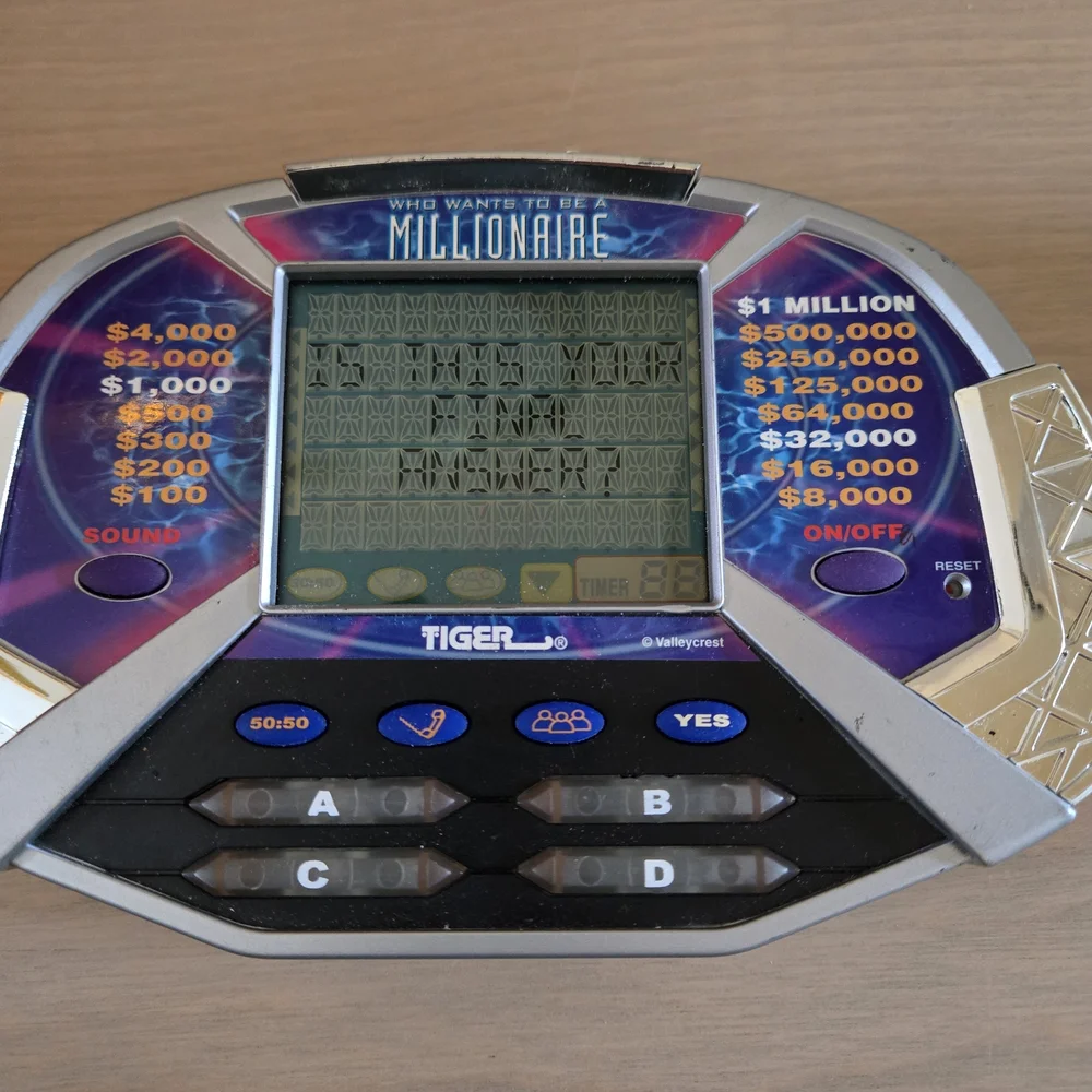 Vtg Who Wants To Be A Millionaire Handheld Electronic LCD Tiger Game Tested Work